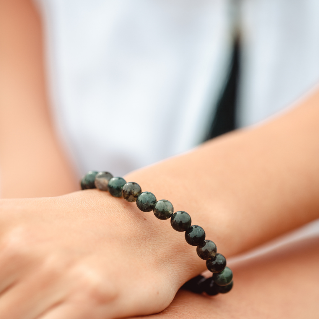 Close up of Moss Agate crystal Mala Bead bracelet