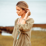 Woman wearing Rainbow Fluorite crystal Mala Bead Set