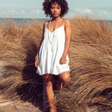 Woman standing in front of long grass wearing Ambarya Hope - Amazonite Mala Bead Set