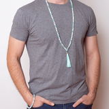 Man wearing Ambarya Loving Communication - Amazonite Mala Bead Necklace