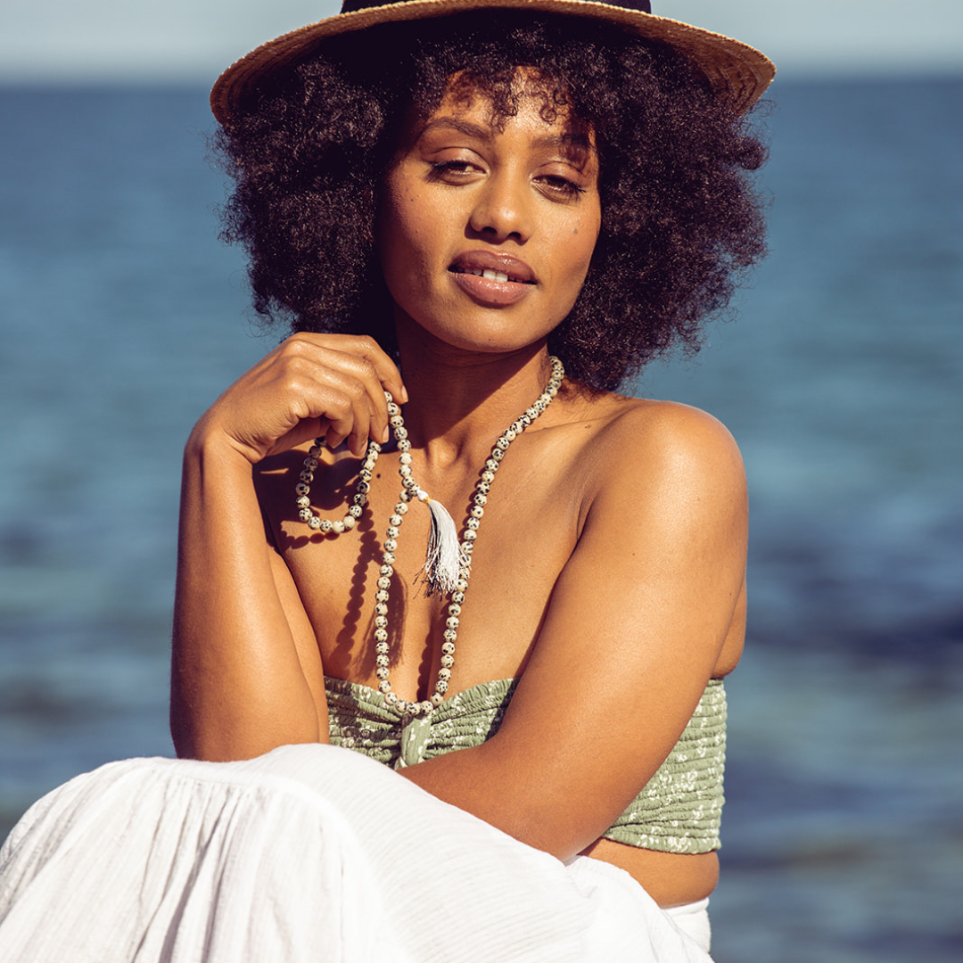 Woman wearing Ambarya Playfulness - Dalmation Stone Mala Bead Set