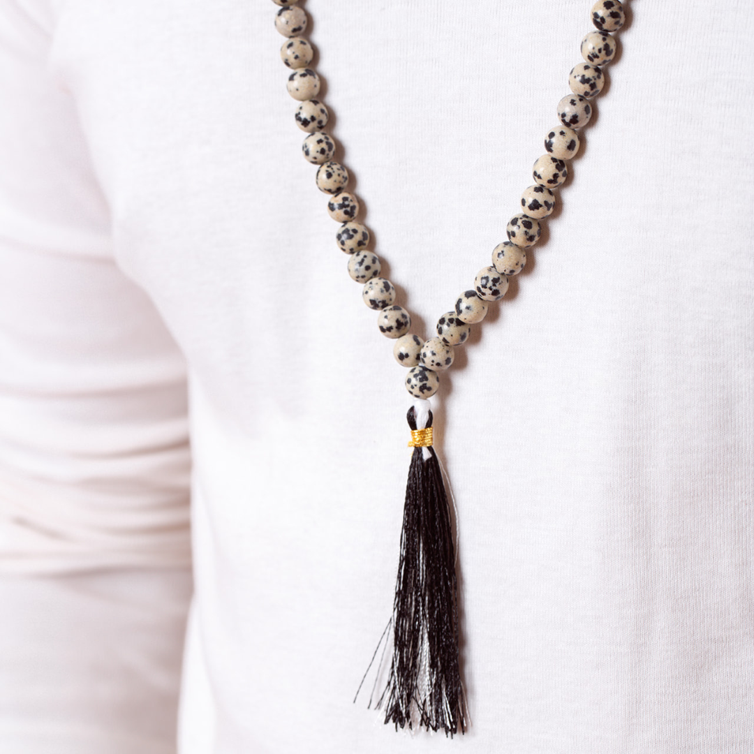Man wearing Ambarya Playfulness - Dalmatian Stone Mala Bead Necklace