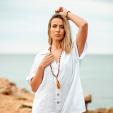Woman wearing Mookaite crystal Mala Bead Set