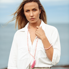 Woman wearing Rose Quartz crystal Mala Bead Set