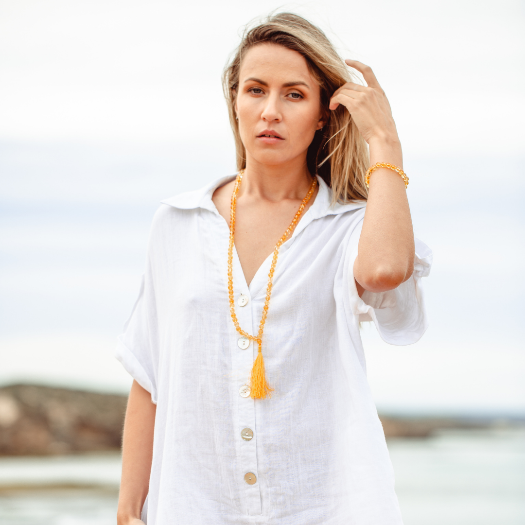 Woman wearing Citrine crystal Mala Bead Set
